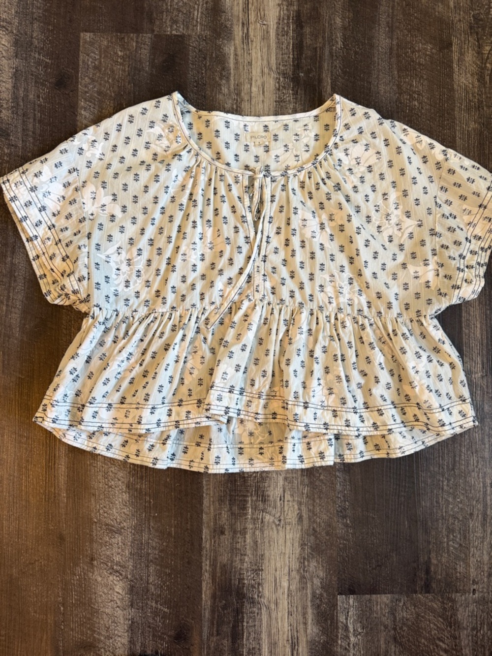 Lightweight White Peplum Top with Blue Floral Print - Picture 2 of 9